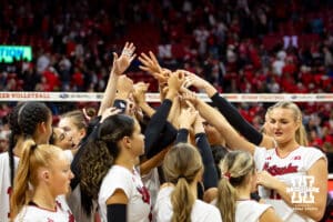 Nebraska Cornhuskers huddle up after the win over Minnesota Golden Gophers during a college volleyball match Thursday, November 14, 2024, in Lincoln, Nebraska. Photo by John S. Peterson.