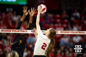 Nebraska Cornhusker Bergen Reilly (2) spikes the ball against Minnesota Golden Gopher Phoebe Awoleye (7) in the fourth set during a college volleyball match Thursday, November 14, 2024, in Lincoln, Nebraska. Photo by John S. Peterson.