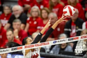 Nebraska Cornhusker Harper Murray (27) reaches for the ball against the Minnesota Golden Gophers in the second set during a college volleyball match Thursday, November 14, 2024, in Lincoln, Nebraska. Photo by John S. Peterson.