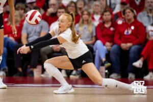 Nebraska Cornhusker Olivia Mauch (10) digs the ball against the Minnesota Golden Gophers in the second set during a college volleyball match Thursday, November 14, 2024, in Lincoln, Nebraska. Photo by John S. Peterson.