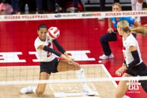 Nebraska Cornhusker Harper Murray (27) digs the ball against the Minnesota Golden Gophers during a college volleyball match Thursday, November 14, 2024, in Lincoln, Nebraska. Photo by John S. Peterson.