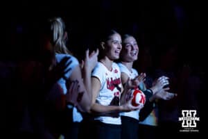 Nebraska Cornhusker Merritt Beason (13) smiles as she is introduced during a college volleyball match against the Minnesota Golden Gophers Thursday, November 14, 2024, in Lincoln, Nebraska. Photo by John S. Peterson.
