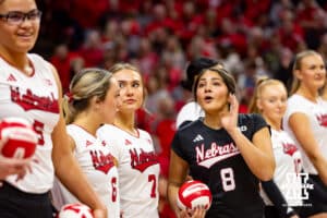 Nebraska Cornhusker Lexi Rodriguez (8) talks to a teammate during a college volleyball match against the Minnesota Golden Gophers Thursday, November 14, 2024, in Lincoln, Nebraska. Photo by John S. Peterson.