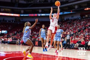 Nebraska Cornhusker guard Logan Nissley (2) makes a layup against Southern Lady Jaguar guard DShantae Edwards (5) in the second half during a college basketball game Tuesday, November 12, 2024, in Lincoln, Nebraska. Photo by John S. Peterson.