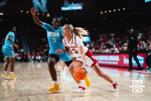 Nebraska Cornhusker Alberte Rimdal (5) dribbles the ball against Southern Lady Jaguar guard Taniya Lawson (3) in the first half during a college basketball game on Tuesday, November 12, 2024, in Lincoln, Nebraska. Photo by Charlotte A. Gottfried.