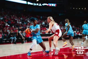 Nebraska Cornhusker Natalie Potts (22) defends against Southern Lady Jaguar guard DaKiyah Sanders (4) during a college basketball game on Tuesday, November 12, 2024, in Lincoln, Nebraska. Photo by Charlotte A. Gottfried.