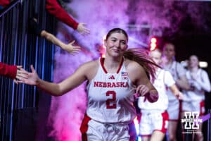 Nebraska Cornhusker guard Logan Nissley (2) leads the Huskers out to the court to take on the Southern Lady Jaguars during a college basketball game Tuesday, November 12, 2024, in Lincoln, Nebraska. Photo by John S. Peterson.