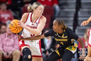 Nebraska Cornhusker guard Allison Weidner (3) hold the ball away from SE Louisiana Lady Lion guard Jalencia Pierre (1) in the first half during a women’s college baskteball game Saturday, November 9, 2024, in Lincoln, Nebraska. Photo by John S. Peterson.