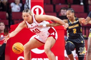 Nebraska Cornhusker center Alexis Markowski (40) reaches for the ball against SE Louisiana Lady Lion guard Arianna Patton (2) in the first half during a women’s college baskteball game Saturday, November 9, 2024, in Lincoln, Nebraska. Photo by John S. Peterson.