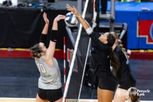 Papillion-La Vista South's Lyric Judson-hazlewood (7) blocks Millard West's Ava Waters (10) during the semi-finals of the 2024 NSAA Volleyball Championships Friday, November 8, 2024, in Lincoln, Nebraska. Photo by John S. Peterson.