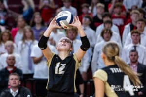 Thayer Central's Olivia Wiedel (12) sets the ball against Johnson-Brock during the semi-finals of the 2024 NSAA Volleyball Championships Friday, November 8, 2024, in Lincoln, Nebraska. Photo by John S. Peterson.