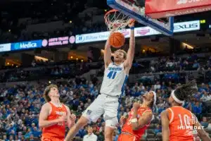 Isaac Traudt dunks during a college basketball game November 6th, 2024 in Omaha Nebraska. Photo by Brandon Tiedemann.