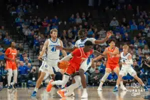 Isaac Traudt and Fredrick King defend during a college basketball game November 6th, 2024 in Omaha Nebraska. Photo by Brandon Tiedemann.