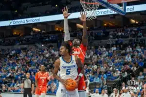 Jamiya Neal looks to pass during a college basketball game November 6th, 2024 in Omaha Nebraska. Photo by Brandon Tiedemann.