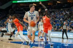 Ryan Kalkbrenner looking to pass during a college basketball game November 6th, 2024 in Omaha Nebraska. Photo by Brandon Tiedemann.