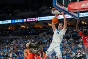 Ryan Kalkbrenner dunks during a college basketball game November 6th, 2024 in Omaha Nebraska. Photo by Brandon Tiedemann.