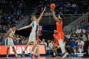 Ty Davis contests a shot during a college basketball game November 6th, 2024 in Omaha Nebraska. Photo by Brandon Tiedemann.