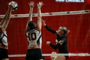 EMF's Miley Ricenbaw (5) spikes the ball against Cambrdge during the NSAA State Volleyball Quarterfinals on November 6th, 2024 at Pinnacle Bank Arena in Lincoln, Nebraska. Photo by Mike Sautter.