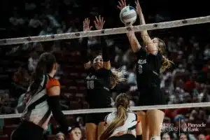EMF's Ella Archer (9) blocks a shot from Cambridge during the NSAA State Volleyball Quarterfinals on November 6th, 2024 at Pinnacle Bank Arena in Lincoln, Nebraska. Photo by Mike Sautter.
