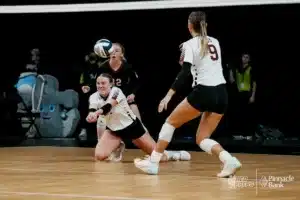 BDS's Campbell Bohling (21) digs the ball against Howells-Dodge during the NSAA State Volleyball Quarterfinals on November 6th, 2024 at Pinnacle Bank Arena in Lincoln, Nebraska. Photo by Mike Sautter.