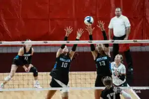 Shelton's Kaycee Tompkin (10) and Erin Gegg (13) against Stuart's Addisyn Ketteler during the NSAA State Volleyball Quarterfinals on November 6th, 2024 at Pinnacle Bank Arena in Lincoln, Nebraska. Photo by Mike Sautter.