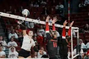 Leyton's Shawnee Gamble (4) spikes the ball against Meridian during the NSAA State Volleyball Quarterfinals on November 6th, 2024 at Pinnacle Bank Arena in Lincoln, Nebraska. Photo by Mike Sautter.
