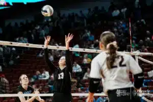 Waverly's McKinley Moser (13) sets the ball against Bennington during the NSAA State Volleyball Quarterfinals on November 6th, 2024 at Pinnacle Bank Arena in Lincoln, Nebraska. Photo by Mike Sautter.