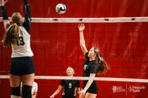 Elkhorn North's Kaitlyn Huff (15) hits the ball over the net against York during the NSAA State Volleyball Quarterfinals on November 6th, 2024 at Pinnacle Bank Arena in Lincoln, Nebraska. Photo by Mike Sautter.