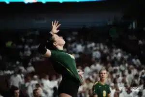 Kearney Catholic serves against Norris Titans during NSAA State Volleyball quarterfinals at Pinnacle Bank Arena on November 6th, 2024. Photo by Mike Sautter