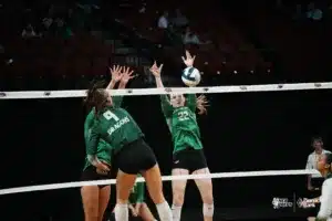 Logann Dostal of Gretna and Amelia Boone of Skutt Catholic during NSAA State Volleyball quarterfinals at Pinnacle Bank Arena on November 6th, 2024. Photo by Mike Sautter