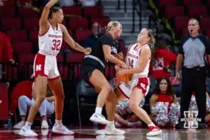 Nebraska Cornhusker guard Callin Hake (14) steals the ball away from Omaha Maverick forward Alison Stephens (11) in the second half during a college women’s baskteball game Monday, November 4, 2024, in Lincoln, Nebraska. Photo by John S. Peterson.