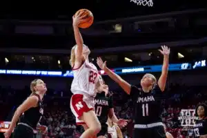 Nebraska Cornhusker guard Britt Prince (23) makes a lay up against Omaha Maverick forward Alison Stephens (11) in the second half during a college women’s baskteball game Monday, November 4, 2024, in Lincoln, Nebraska. Photo by John S. Peterson.