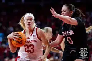 Nebraska Cornhusker guard Britt Prince (23) drives to the basket against Omaha Maverick center Harriet Ford (0) in the second half during a college women’s baskteball game Monday, November 4, 2024, in Lincoln, Nebraska. Photo by John S. Peterson.