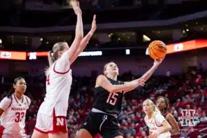 Omaha Maverick forward Paige Horne (15) puts up a lay up against Nebraska Cornhusker forward Petra Bozan (44) in the first half during a college women’s baskteball game Monday, November 4, 2024, in Lincoln, Nebraska. Photo by John S. Peterson.