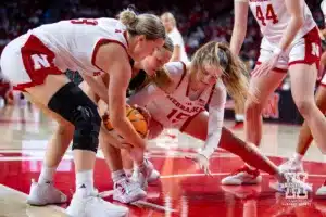 Nebraska Cornhusker guard Allison Weidner (3) and guard Kendall Moriarty (15) reach for the ball againt Omaha Maverick guard Kyana Weir (5) in the first half during a college women’s baskteball game Monday, November 4, 2024, in Lincoln, Nebraska. Photo by John S. Peterson.
