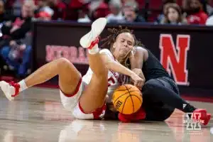 Nebraska Cornhusker guard Alberte Rimdal (5) and Omaha Maverick guard Lauren Perry (2) fight for the ball in the first half during a college women’s baskteball game Monday, November 4, 2024, in Lincoln, Nebraska. Photo by John S. Peterson.