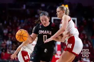 Omaha Maverick center Harriet Ford (0) dribbles the ball against Nebraska Cornhusker forward Jessica Petrie (12) in the first half during a college women’s baskteball game Monday, November 4, 2024, in Lincoln, Nebraska. Photo by John S. Peterson.