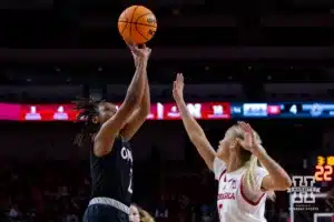 Omaha Maverick guard Lauren Perry (2) takes a shot against Nebraska Cornhusker guard Alberte Rimdal (5) in the first half during a college women’s baskteball game Monday, November 4, 2024, in Lincoln, Nebraska. Photo by John S. Peterson.