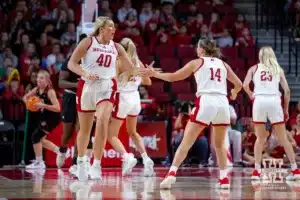 Nebraska Cornhusker center Alexis Markowski (40) gets five from guard Callin Hake (14) in the during a college women’s baskteball game Monday, November 4, 2024, in Lincoln, Nebraska. Photo by John S. Peterson.