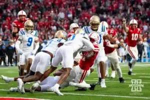 Nebraska Cornhusker running back Emmett Johnson (21) stopped short of the goal line by UCLA Bruin defensive back Ramon Henderson (11) in the fourth quarter during a college football game Saturday, November 2, 2024, in Lincoln, Nebraska. Photo by John S. Peterson.