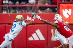 Nebraska Cornhusker defensive back Tommi Hill (6) breaks up a pass to UCLA Bruin wide receiver Titus Mokiao-Atimalala (2) during a college football game Saturday, November 2, 2024, in Lincoln, Nebraska. Photo by John S. Peterson.