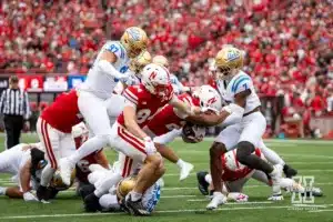 Nebraska Cornhusker running back Dante Dowdell (23) tackled by UCLA Bruin defensive back K.J. Wallace (7) in the second quarter during a college football game Saturday, November 2, 2024, in Lincoln, Nebraska. Photo by John S. Peterson.
