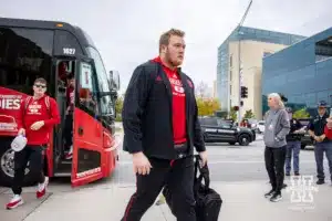 Nebraska Cornhusker offensive lineman Gunnar Gottula (77) walks to the stadium in the Legacy Walk before the college football game against the UCLA Bruins Saturday, November 2, 2024, in Lincoln, Nebraska. Photo by John S. Peterson.