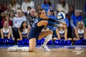 Creighton Bluejay libreo Maddy Bilinovic (22) digs the ball against the St. John's Red Storm in the third set during a college volleyball match Friday, November 1, 2024, in Omaha, Nebraska. Photo by John S. Peterson.
