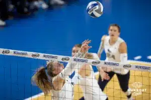 Creighton Bluejay setter Kendra Wait (15) sets the ball against the St. John's Red Storm in teh first set during a college volleyball match Friday, November 1, 2024, in Omaha, Nebraska. Photo by John S. Peterson.