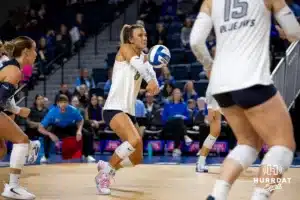 Creighton Bluejay outside hitter Ava Martin (8) digs the ball against the St. John's Red Storm in the first set during a college volleyball match Friday, November 1, 2024, in Omaha, Nebraska. Photo by John S. Peterson.