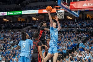 Creighton Bluejays Jackson McAndrew attempts a layup against St John's Red Storm during a college basketball game Tuesday, December 31, 2024, in Omaha, Nebraska. Photo by Brandon Tiedemann.