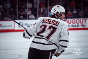 UNO Mavericks player, Jimmy Watkins, looks for the puck during a college hockey game on Dec 29, 2024 in Omaha, Nebraska. Photo by Logan Hock