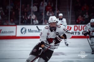 UNO Mavericks player, Jacob Slipec, makes a run at the goal during a college hockey game on Dec 29, 2024 in Omaha, Nebraska. Photo by Logan Hock