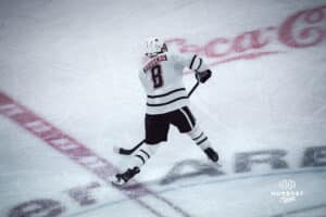 UNO Mavericks player, Marcus Broberg, makes a pass during a college hockey game on Dec 29, 2024 in Omaha, Nebraska. Photo by Logan Hock